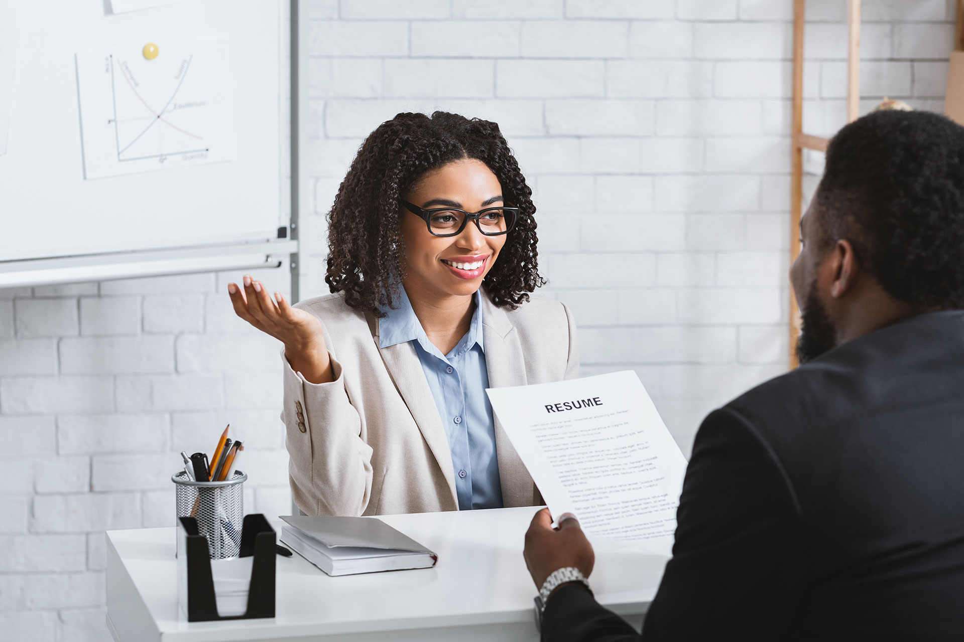 friendly personnel manager interviewing black cand 2022 12 16 07 56 17 utc